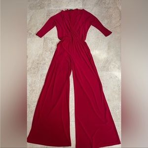 Wide leg elastic waist cross over red jumpsuit. Size small. *Belt NOT included*